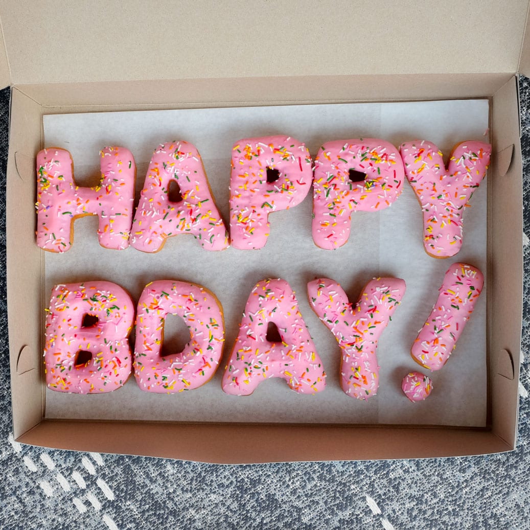 Donut letters that spell happy bday!
